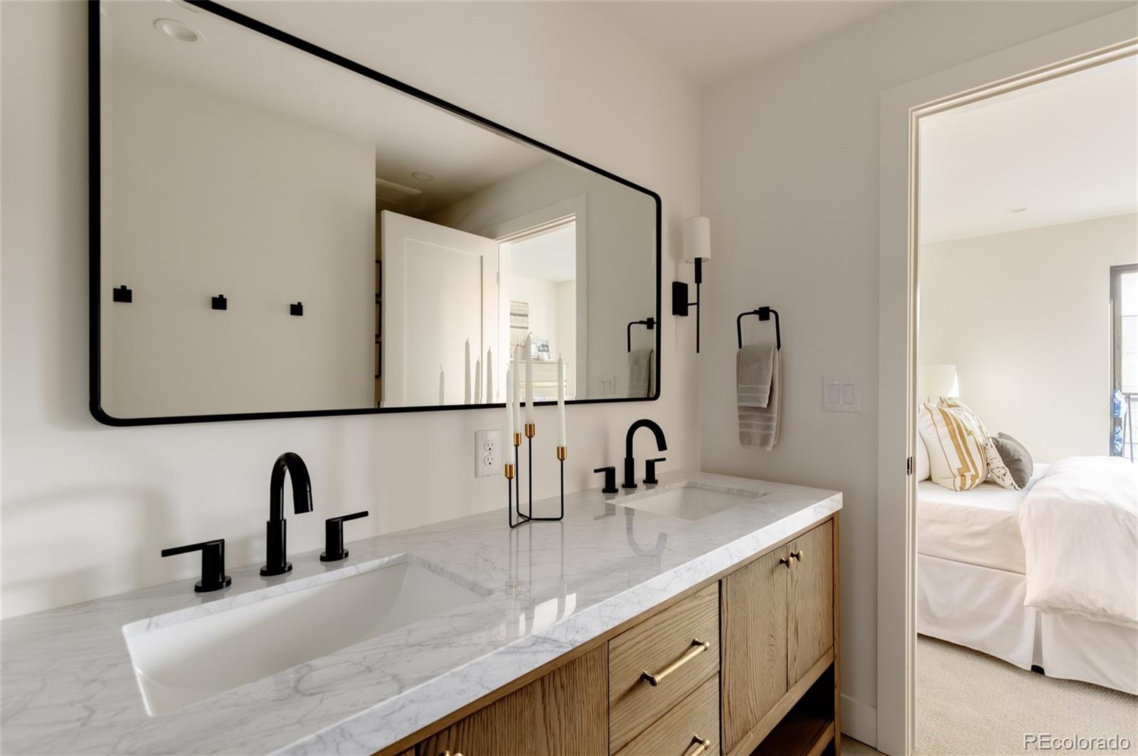 1749 North Williams Street, Unit 2 Denver, CO 80218 - Photo 20 of 34 a bathroom with a sink and a mirror