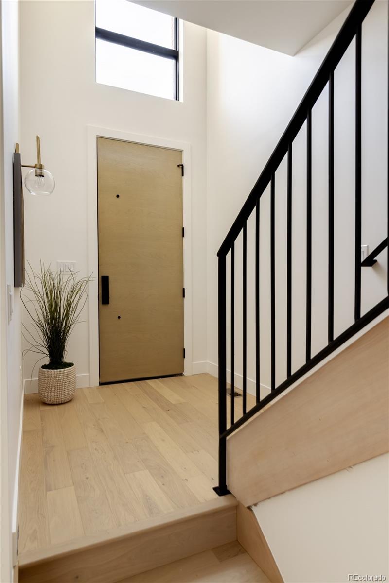1749 North Williams Street, Unit 2 Denver, CO 80218 - Photo 24 of 34 a view of a porch with wooden floor
