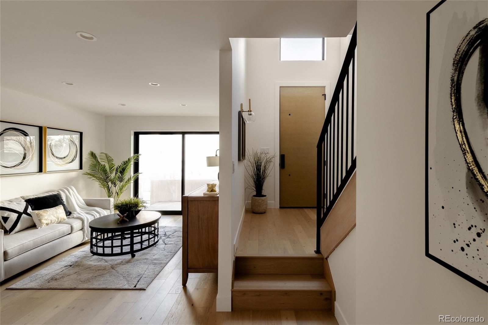 1749 North Williams Street, Unit 2 Denver, CO 80218 - Photo 25 of 34 a living room with furniture and a potted plant