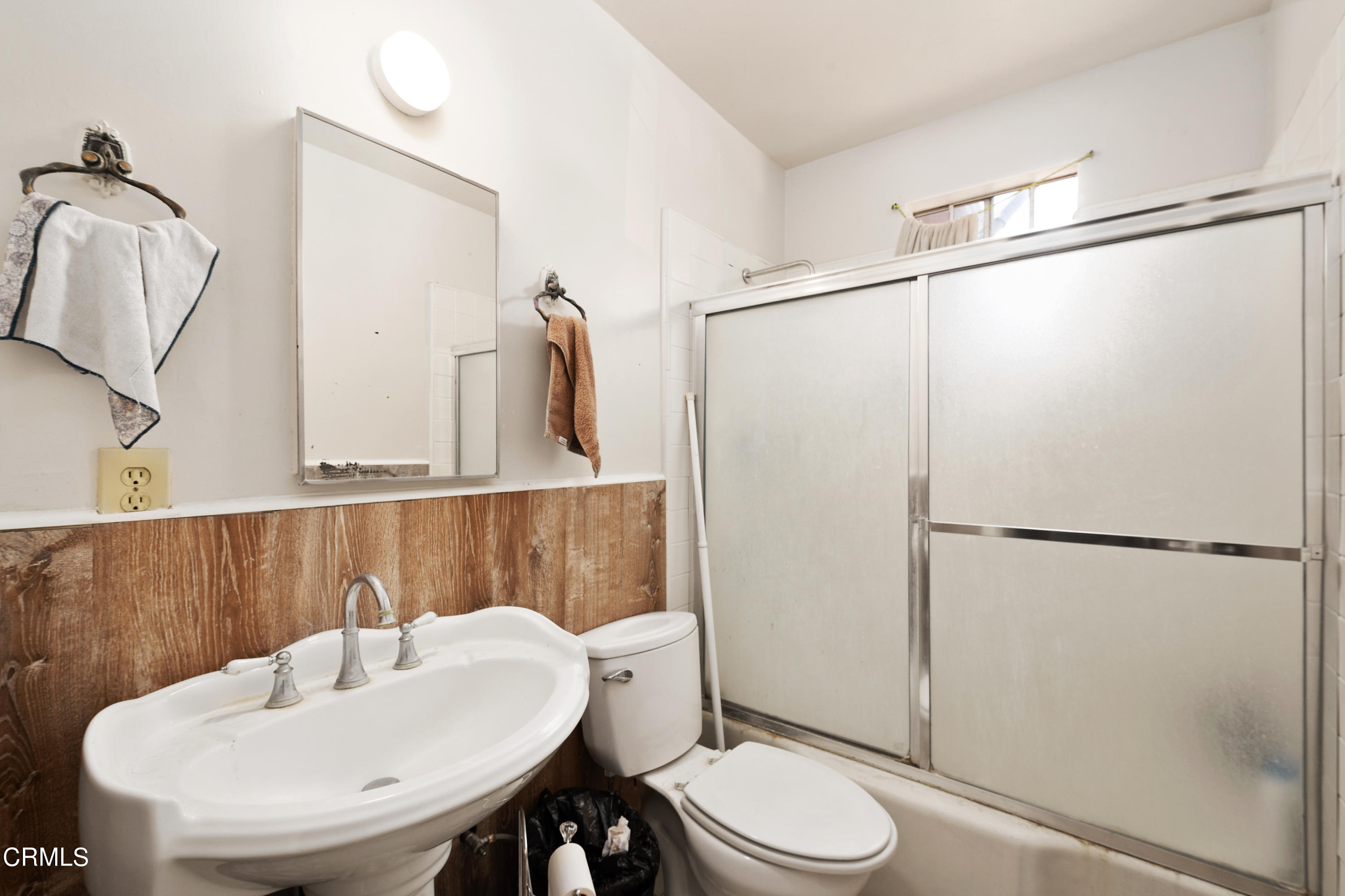 11208 Aster Street Ventura, CA 93004 - Photo 13 of 33 a bathroom with a sink and a mirror