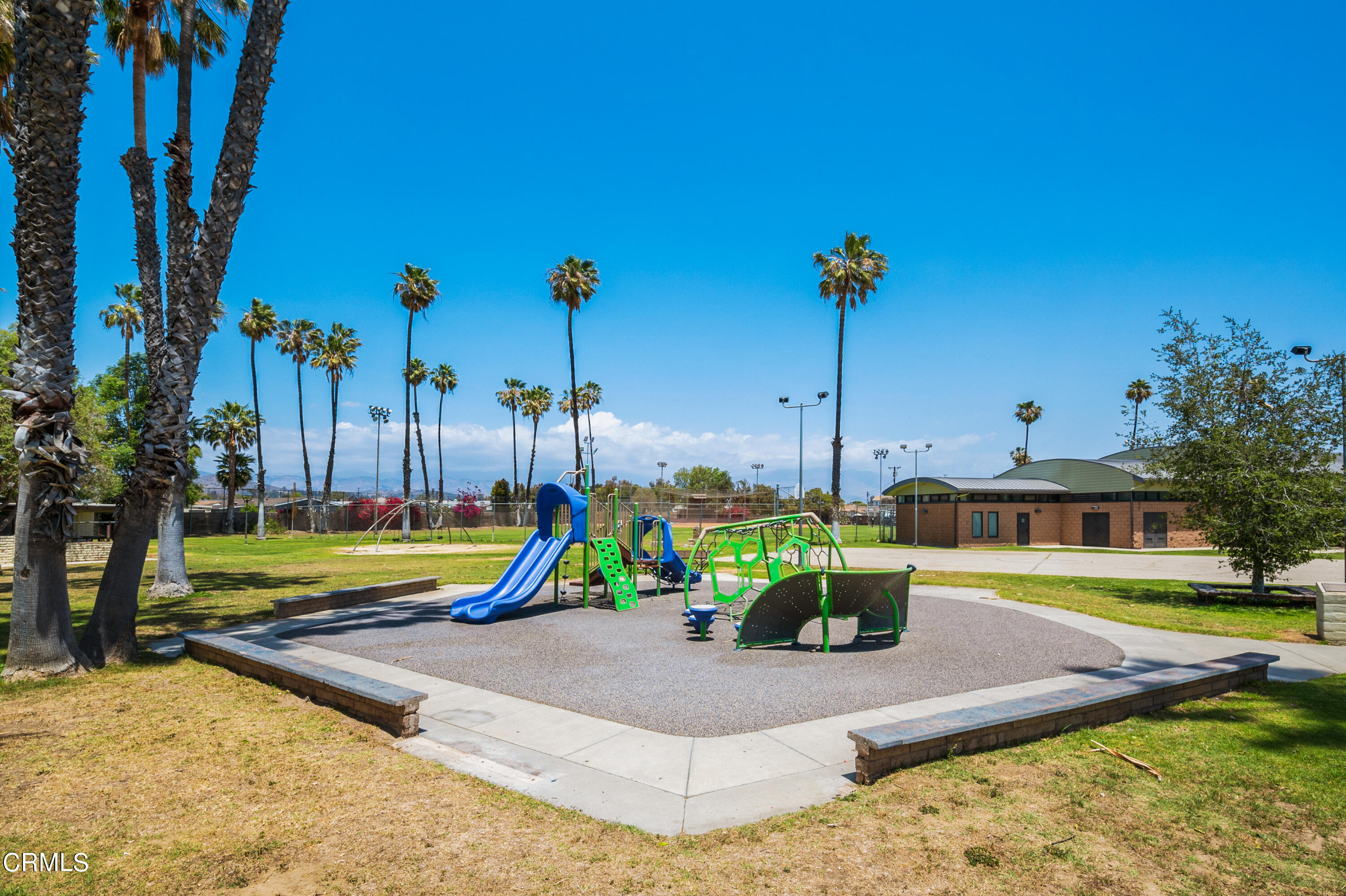 11208 Aster Street Ventura, CA 93004 - Photo 28 of 33 a view of a swimming pool with a yard