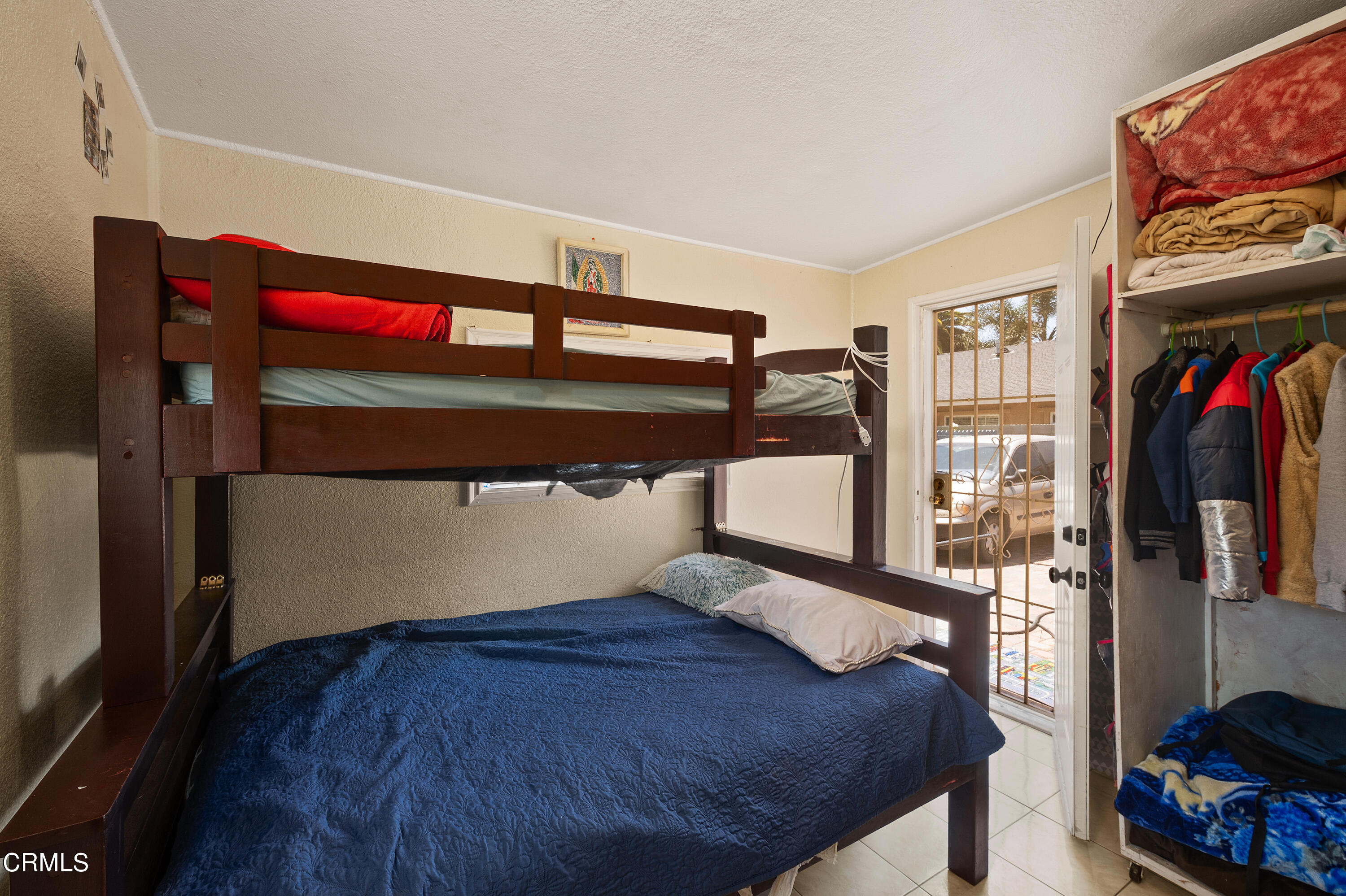 11208 Aster Street Ventura, CA 93004 - Photo 9 of 33 a bedroom with a bed and a closet