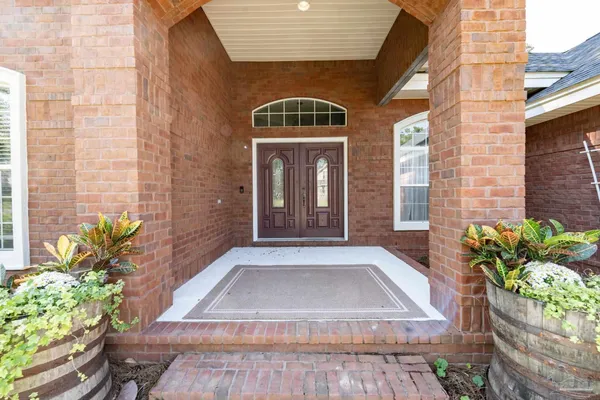 a front view of a house with outdoor space