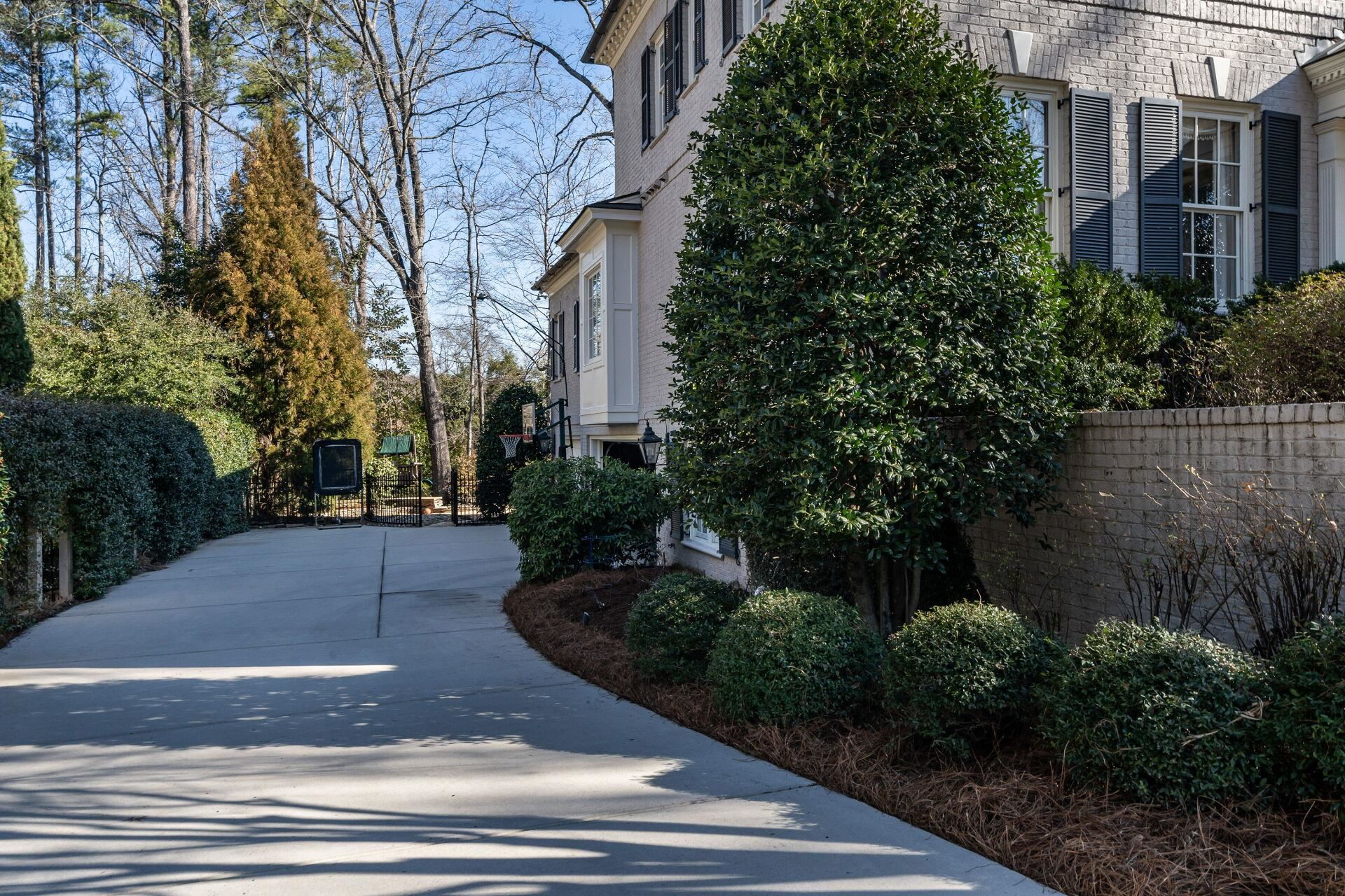 615 Transylvania Avenue Raleigh, NC 27609 - Photo 26 of 27 Driveway to Side-Entry Garage