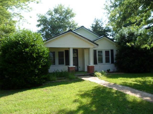 392 Rabbit Trail Road Leoma, TN 38468 - Photo 13 of 19 a view of a house with a yard and porch