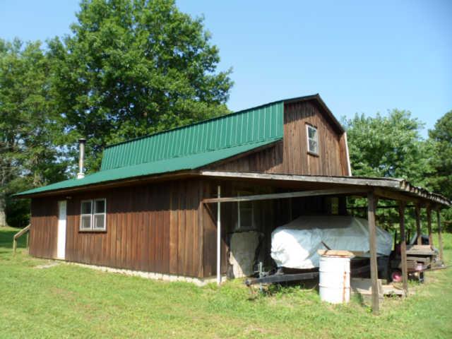 392 Rabbit Trail Road Leoma, TN 38468 - Photo 18 of 19 a front view of a house with garden