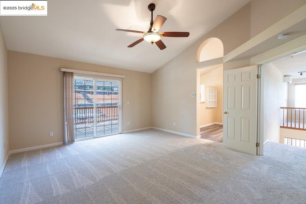 1003 Linda Vista Way Rio Vista, CA 94571 - Photo 27 of 60 Carpeted empty room with lofted ceiling, healthy amount of natural light, and a ceiling fan