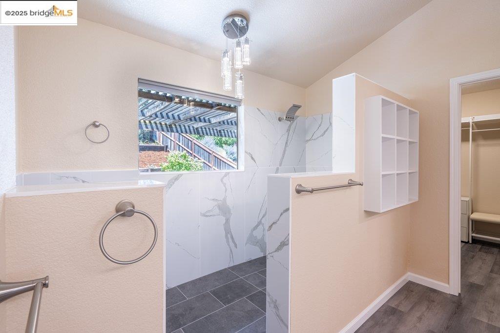 1003 Linda Vista Way Rio Vista, CA 94571 - Photo 35 of 60 Bathroom with a marble finish shower and a walk in closet