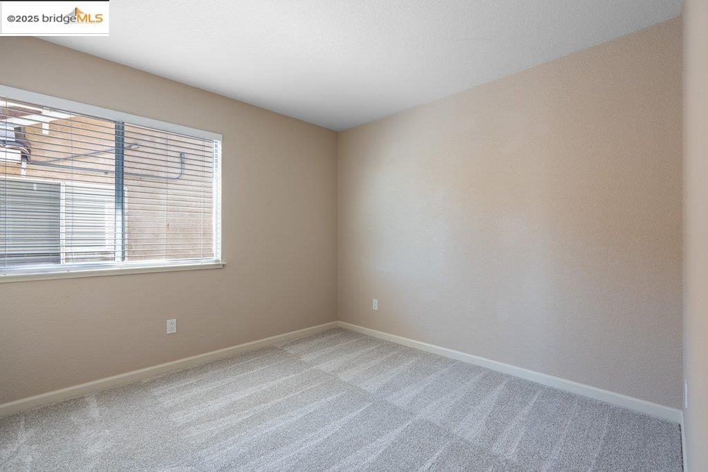 1003 Linda Vista Way Rio Vista, CA 94571 - Photo 38 of 60 Spare room with light colored carpet and baseboards