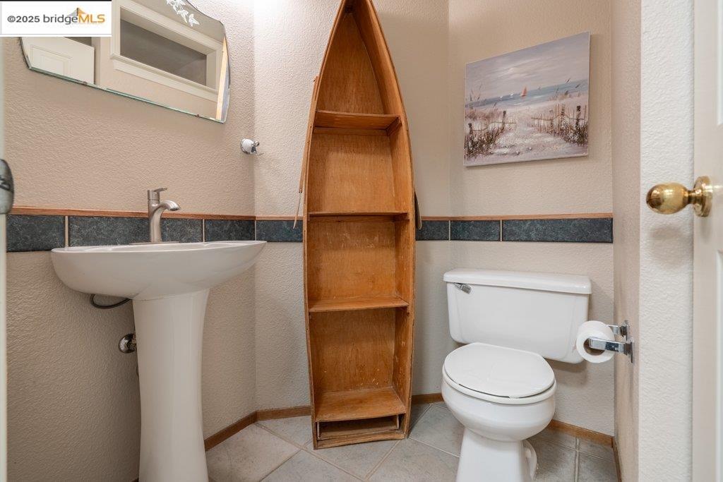 1003 Linda Vista Way Rio Vista, CA 94571 - Photo 43 of 60 Bathroom featuring a textured wall and tile patterned floors