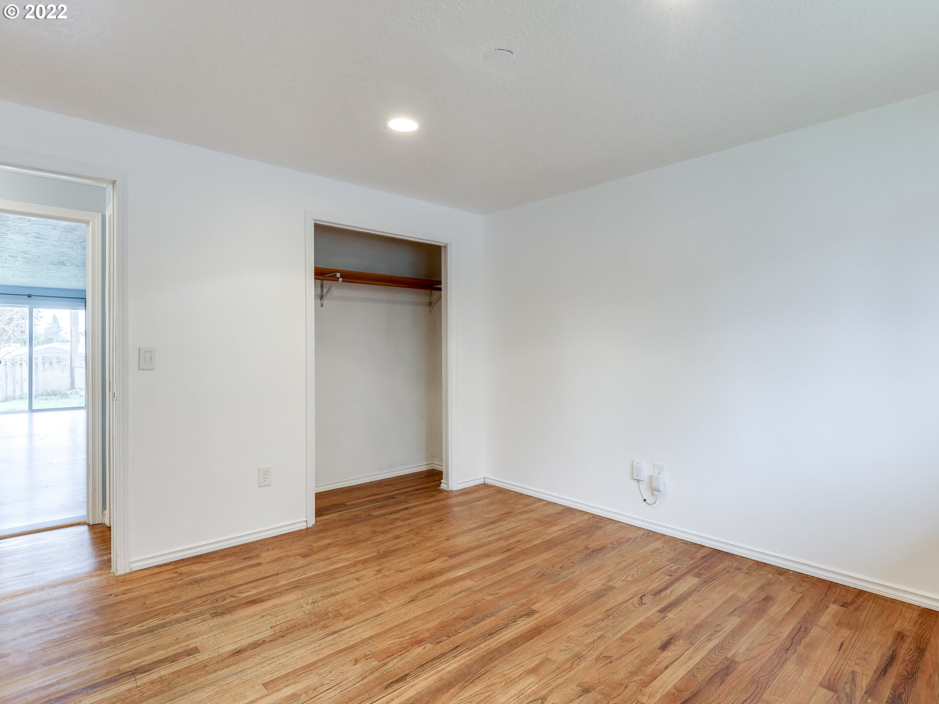 1902 Southeast 151st Avenue Portland, OR 97233 - Photo 20 of 30 a view of empty room with wooden floor