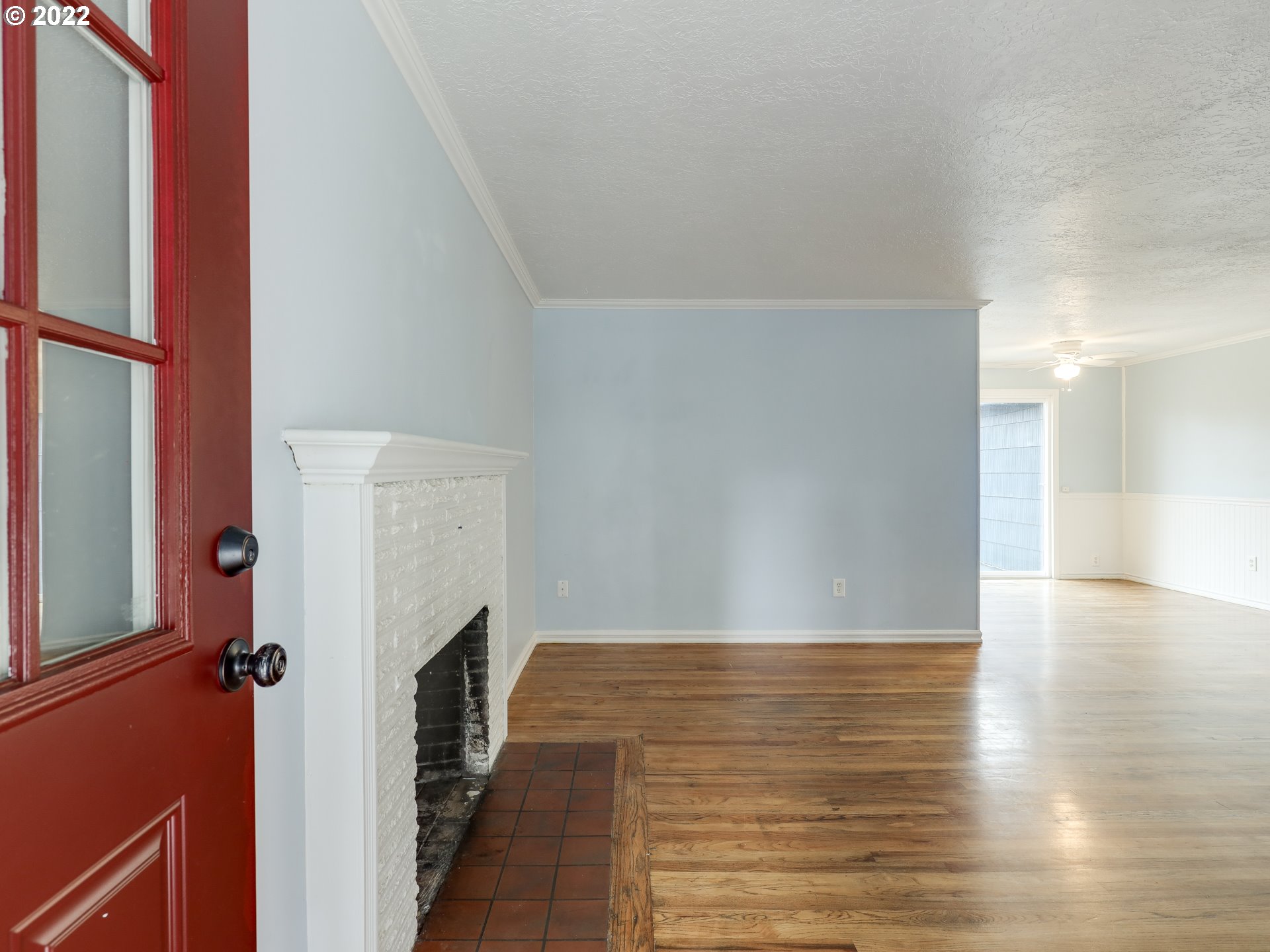 1902 Southeast 151st Avenue Portland, OR 97233 - Photo 5 of 30 a view of hallway with stairs and wooden floor