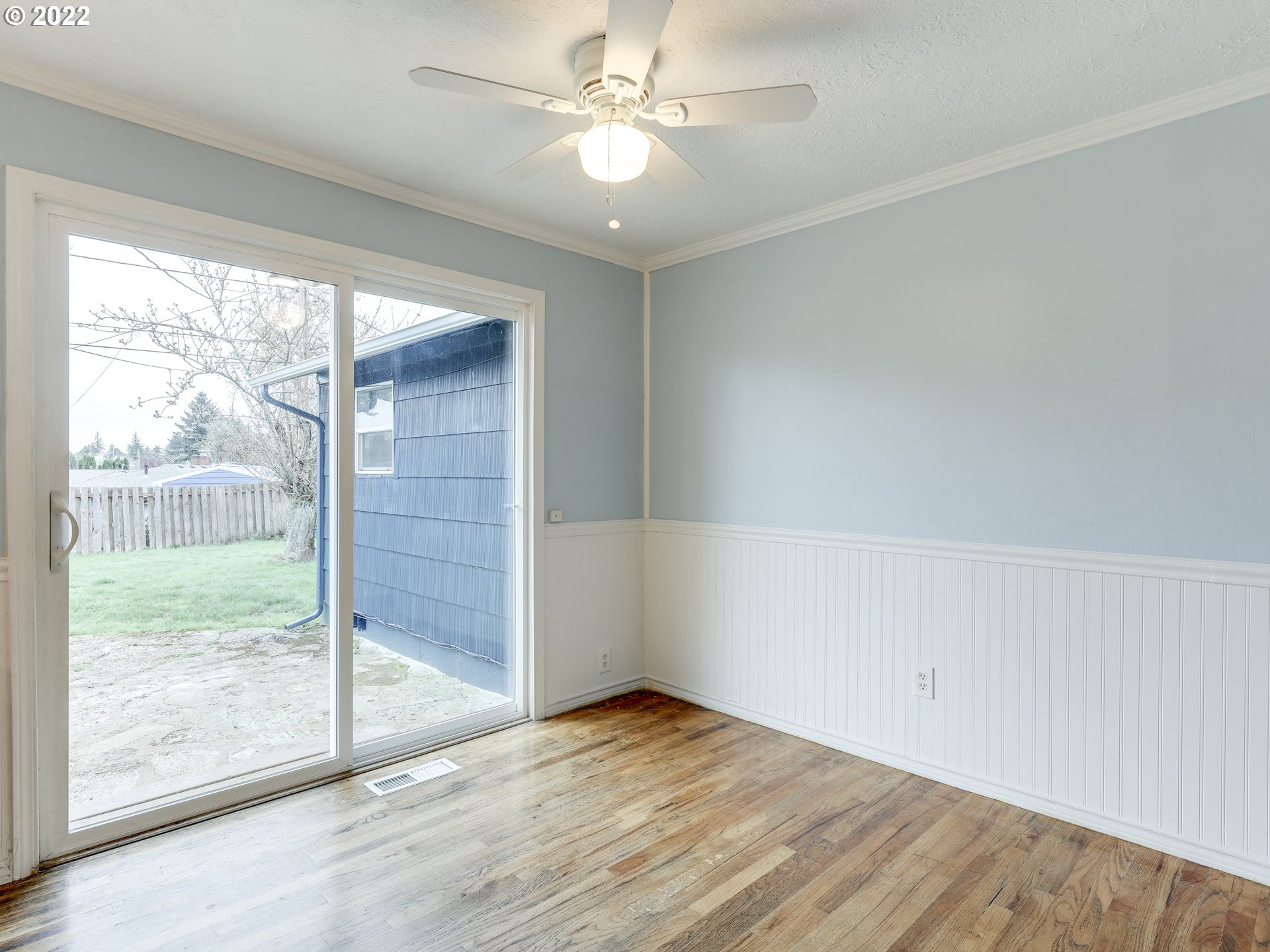 1902 Southeast 151st Avenue Portland, OR 97233 - Photo 9 of 30 wooden floor in an empty room with a window