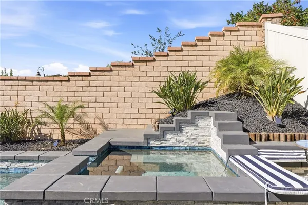 an aerial view of residential house with outdoor space and mountain view