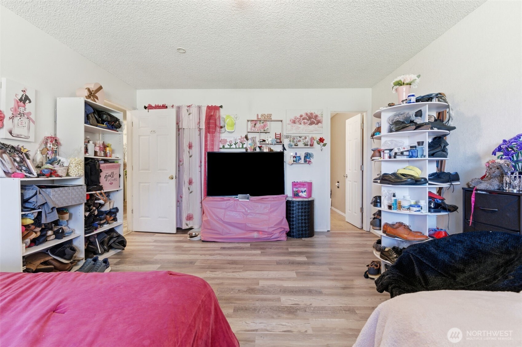 3017 Galvin Road, Unit A Centralia, WA 98531 - Photo 11 of 39 a bedroom with a bed and a walk in closet