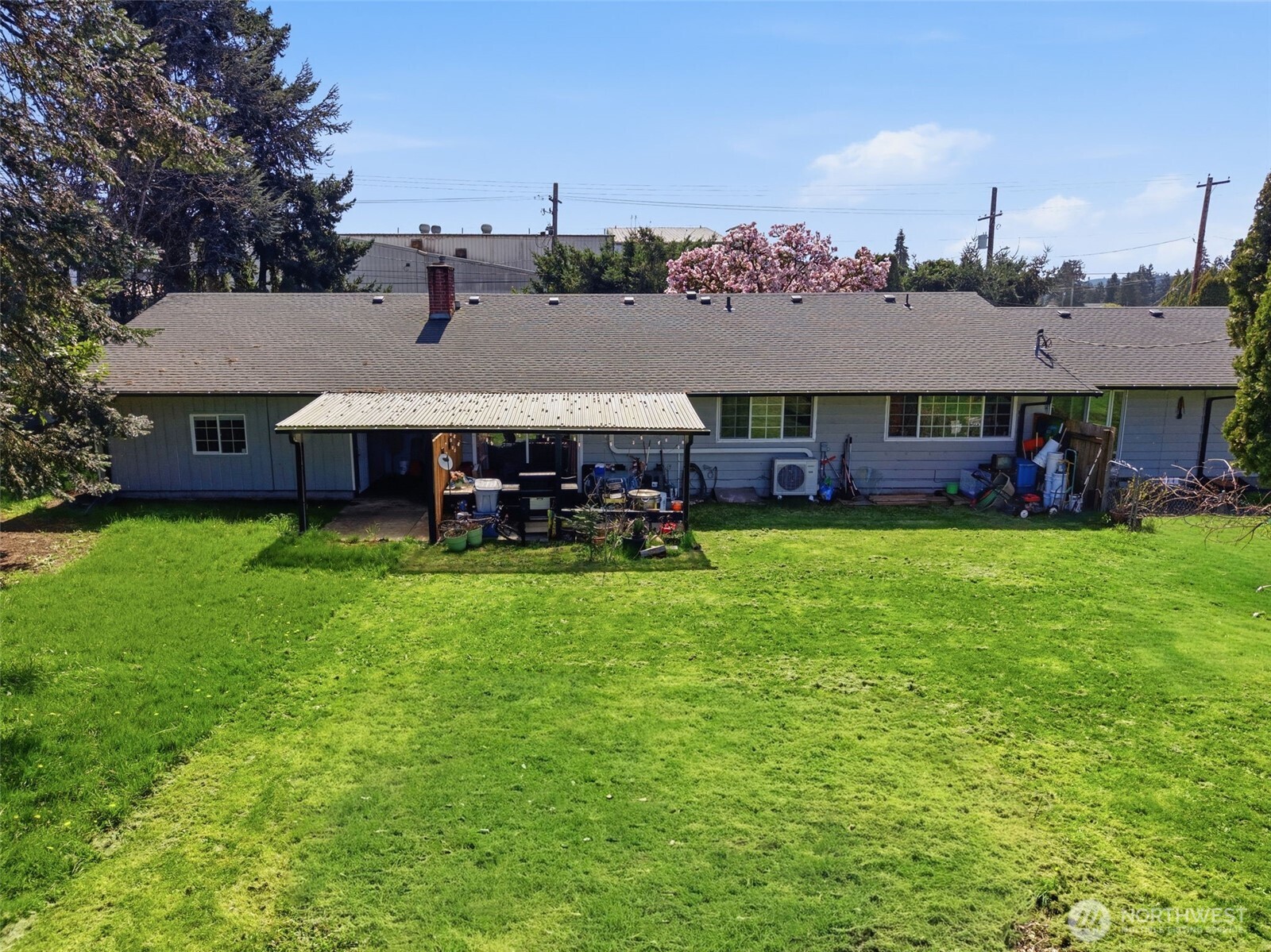 3017 Galvin Road, Unit A Centralia, WA 98531 - Photo 31 of 39 a aerial view of a house with a garden and outdoor seating