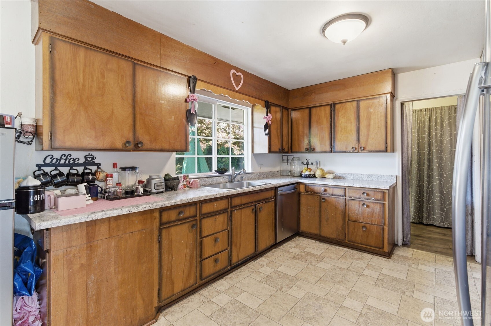 3017 Galvin Road, Unit A Centralia, WA 98531 - Photo 8 of 39 a kitchen with sink cabinets and window