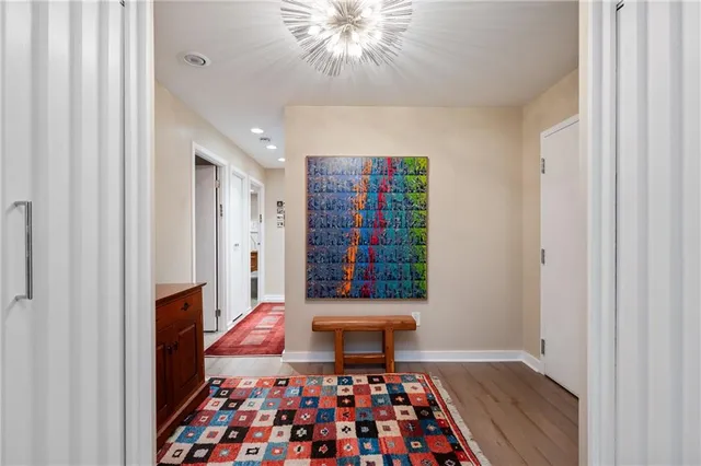a living room with furniture and a rug