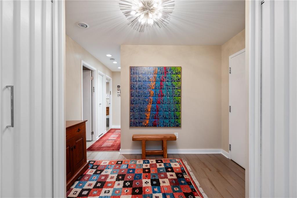 540 North Neville Street, Unit 405 Pittsburgh, PA 15213 - Photo 14 of 23 a living room with furniture and a rug