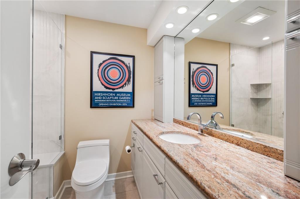 540 North Neville Street, Unit 405 Pittsburgh, PA 15213 - Photo 19 of 23 a bathroom with a sink and a mirror