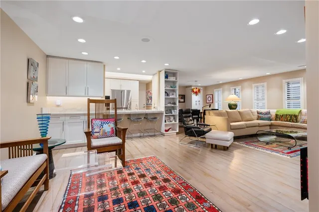 a living room with furniture and a rug