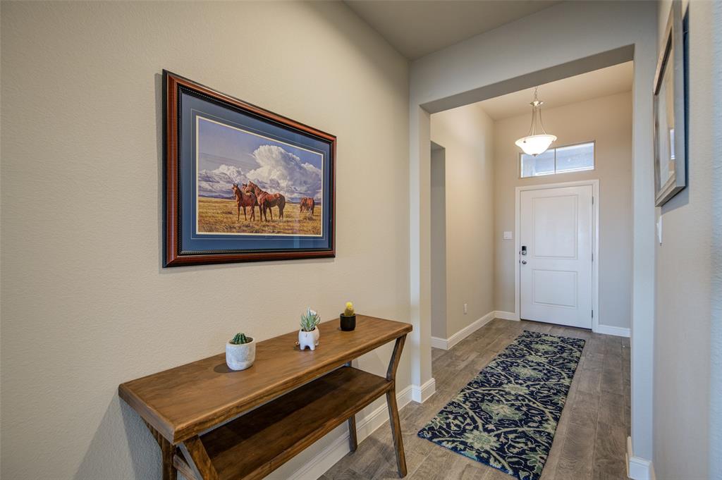 145 Hawksbill Lane Rhome, TX 76078 - Photo 2 of 23 a view of a livingroom with furniture and window