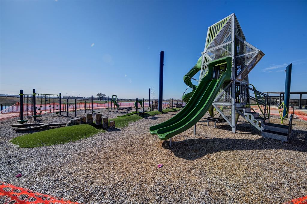 145 Hawksbill Lane Rhome, TX 76078 - Photo 21 of 23 a garden view with a sitting space