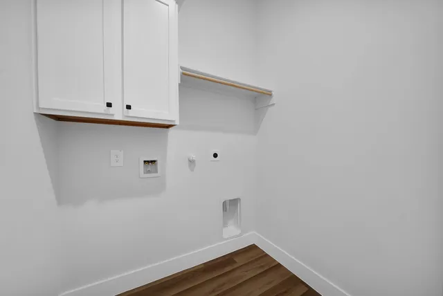 a view of small space with wooden floor