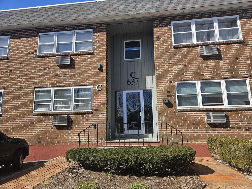 637 Cove Road, Unit C13 Stamford, CT 06902 - Photo 1 of 1 a front view of a house
