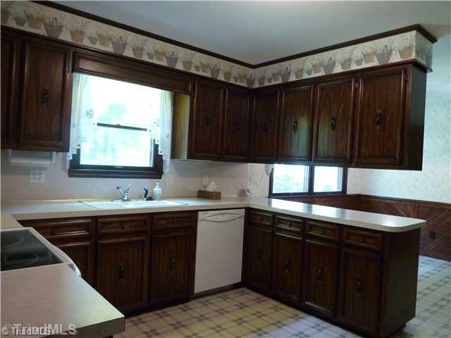1511 Embler Road Lexington, NC 27292 - Photo 8 of 16 Kitchen. Large eat-in kitchen with pantry closet.