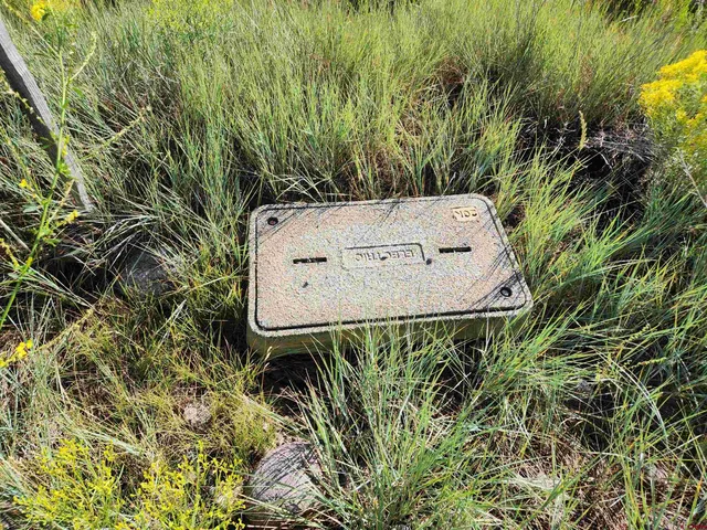 a view of a fireplace in a backyard