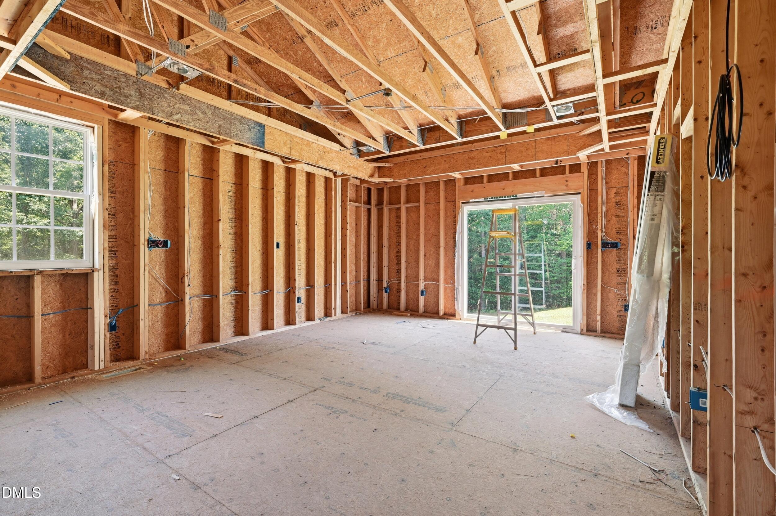 129 Shaman Drive Spring Hope, NC 27882 - Photo 20 of 43 a view of an empty room with windows