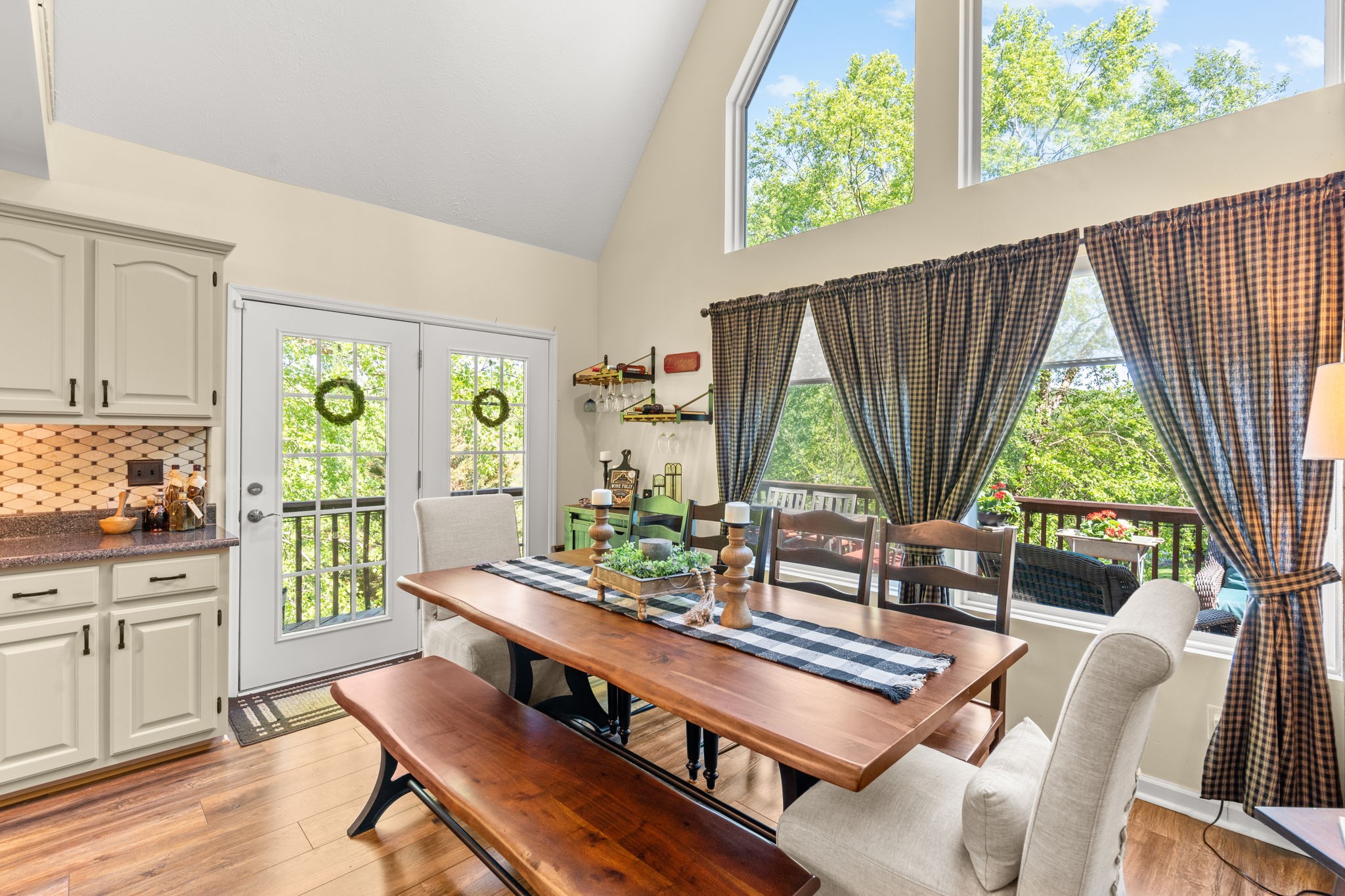 3779 Raleigh-Elam Road Santa Fe, TN 38482 - Photo 16 of 63 a dining room with furniture and a large window
