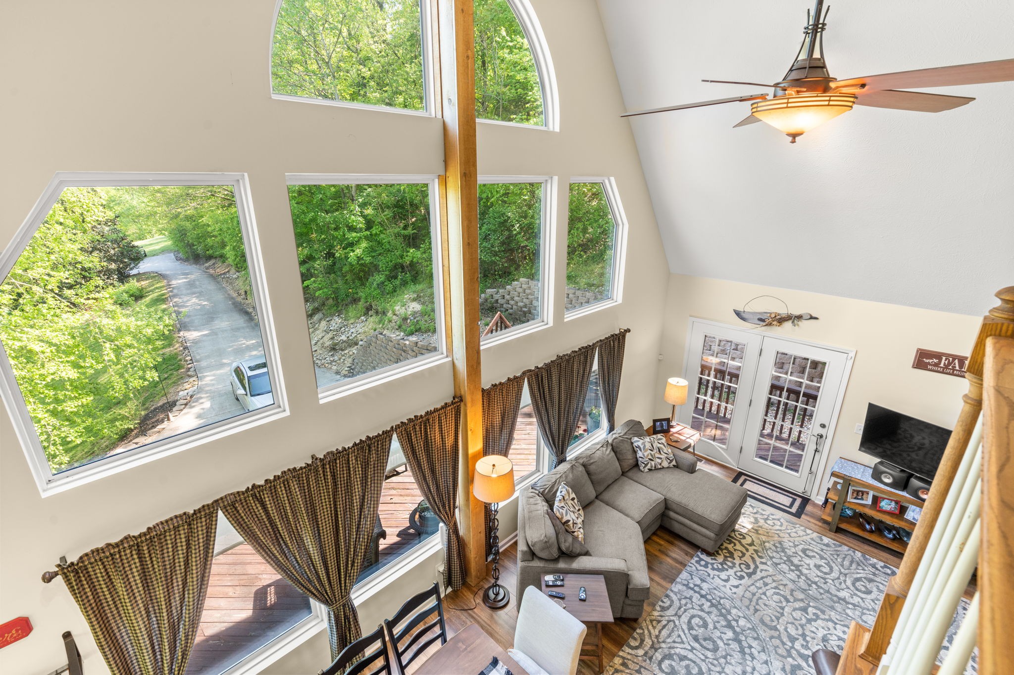 3779 Raleigh-Elam Road Santa Fe, TN 38482 - Photo 22 of 63 a living room with fireplace furniture and a large window