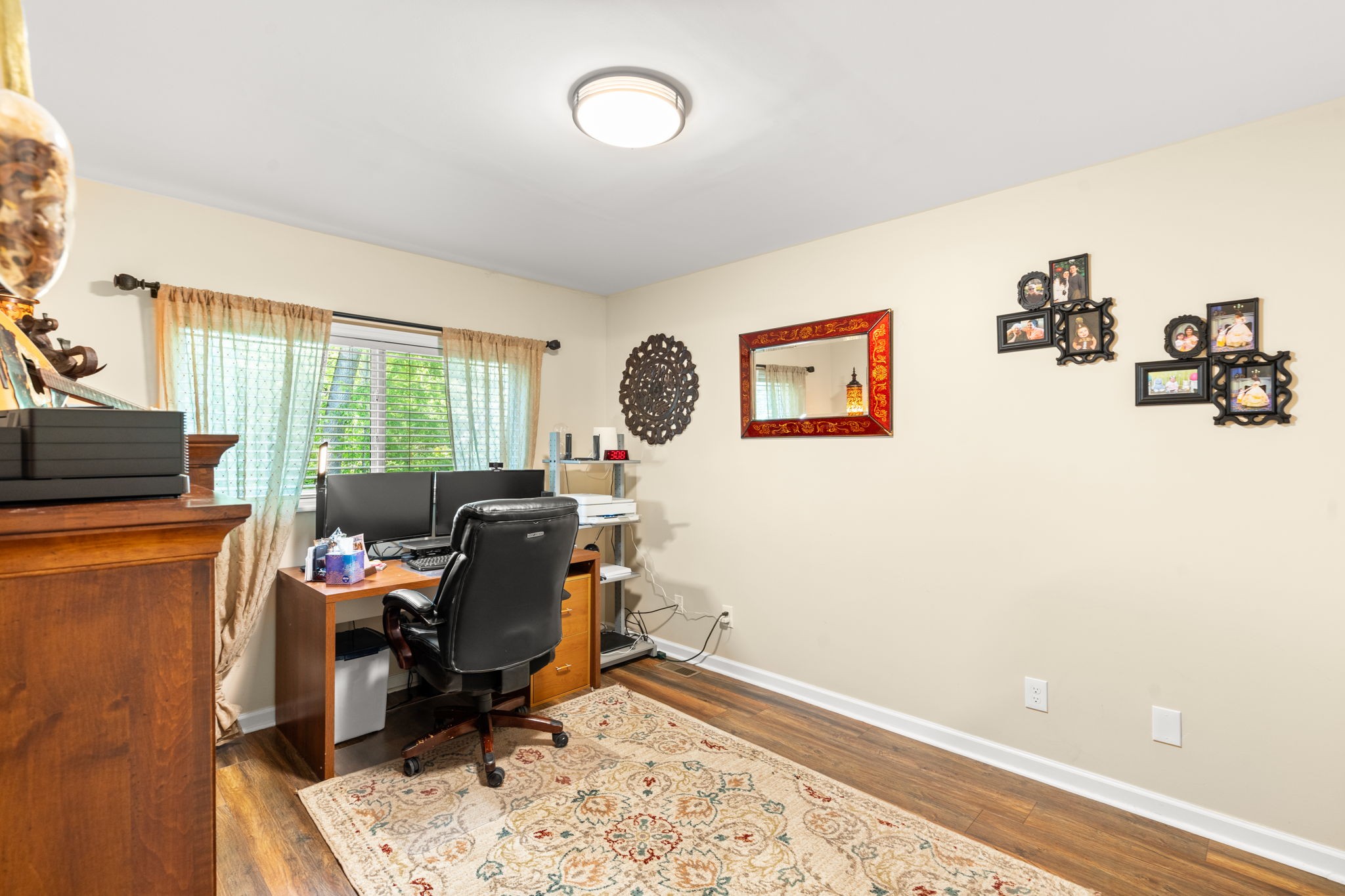 3779 Raleigh-Elam Road Santa Fe, TN 38482 - Photo 27 of 63 a view of a workspace with furniture and a window