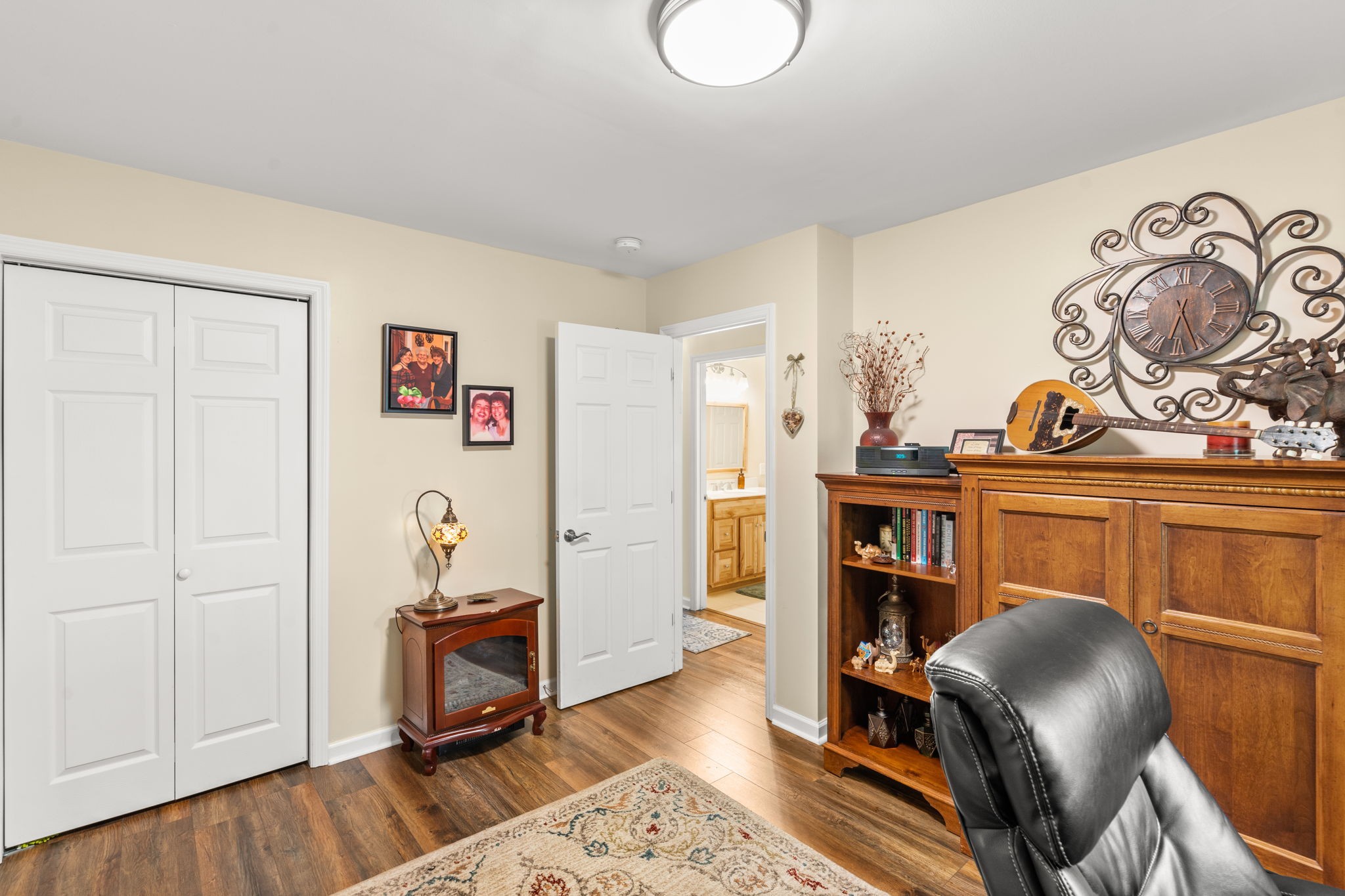3779 Raleigh-Elam Road Santa Fe, TN 38482 - Photo 28 of 63 a view of a workspace with furniture and wooden floor