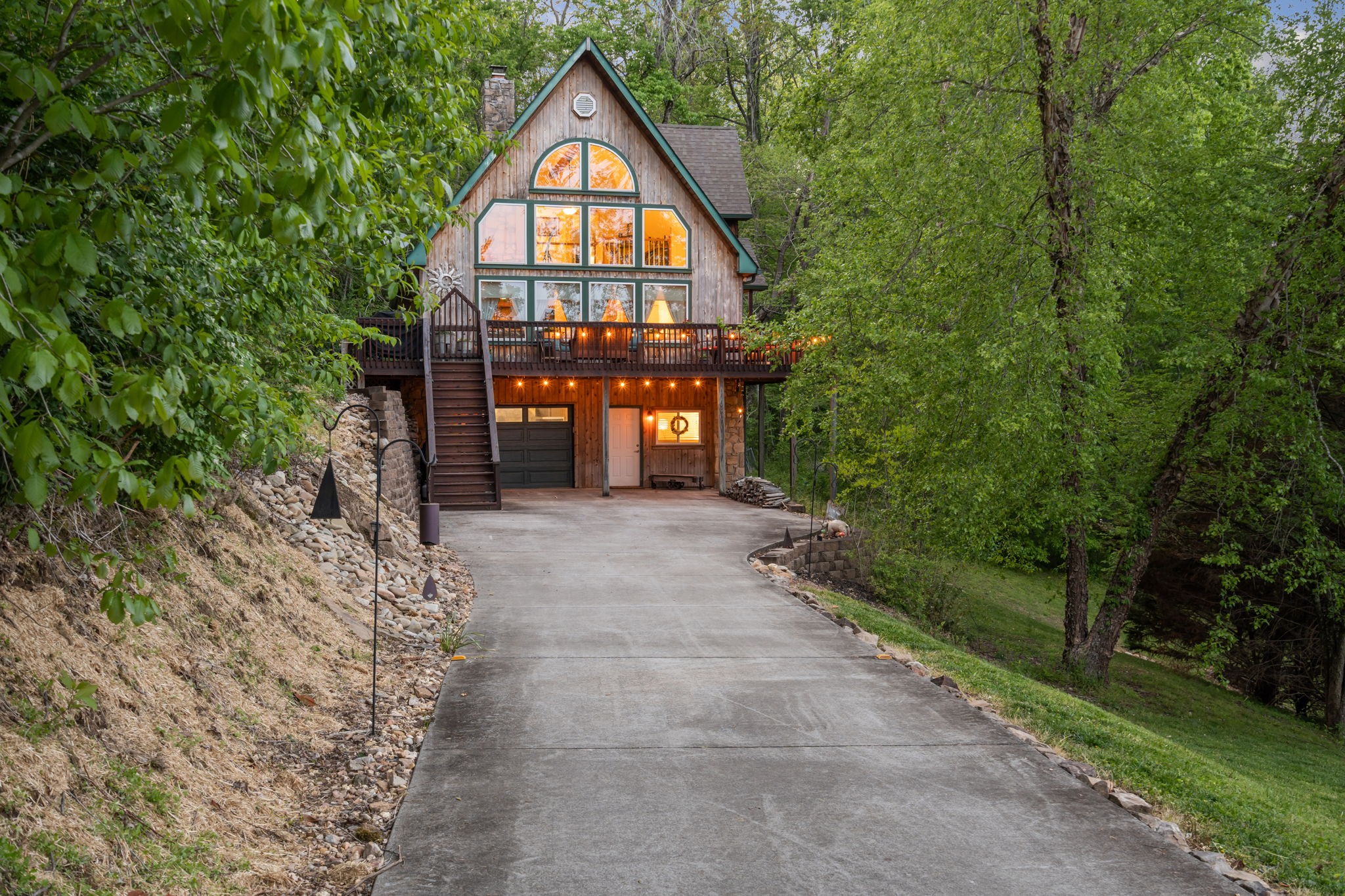 3779 Raleigh-Elam Road Santa Fe, TN 38482 - Photo 4 of 63 a front view of a house with a yard and garage