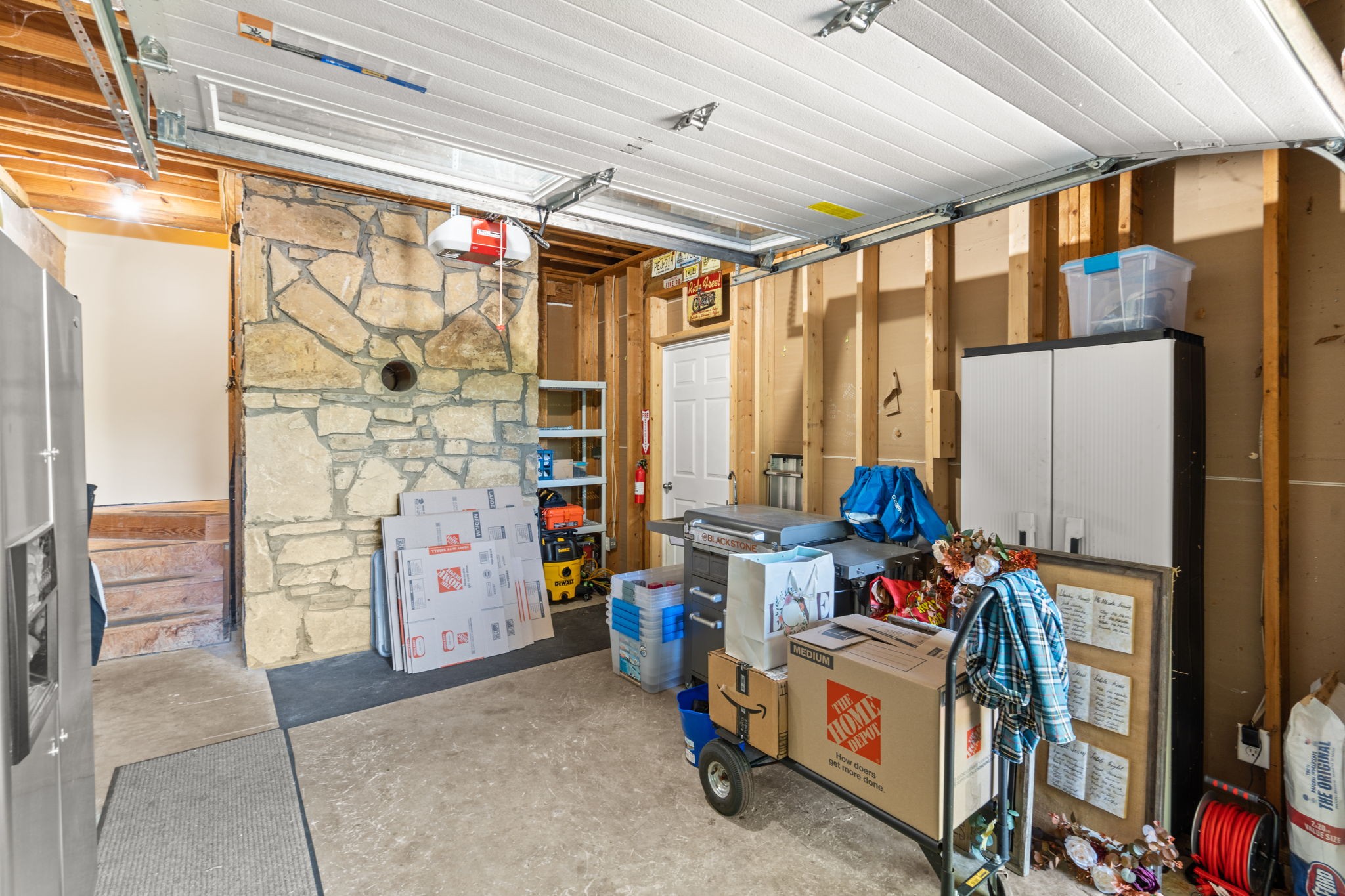 3779 Raleigh-Elam Road Santa Fe, TN 38482 - Photo 41 of 63 a view of walk in closet with clothes and shoes