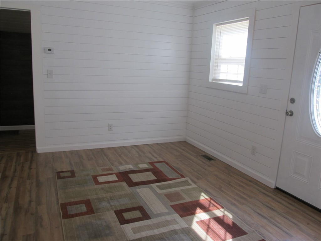 307 Cole Road Townville, SC 29689 - Photo 5 of 16 Den area with ship lap walls and gorgeous laminate