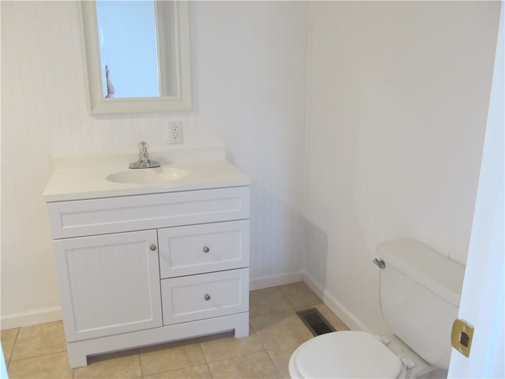 307 Cole Road Townville, SC 29689 - Photo 6 of 16 New vanity, tiled floor and bead board walls.