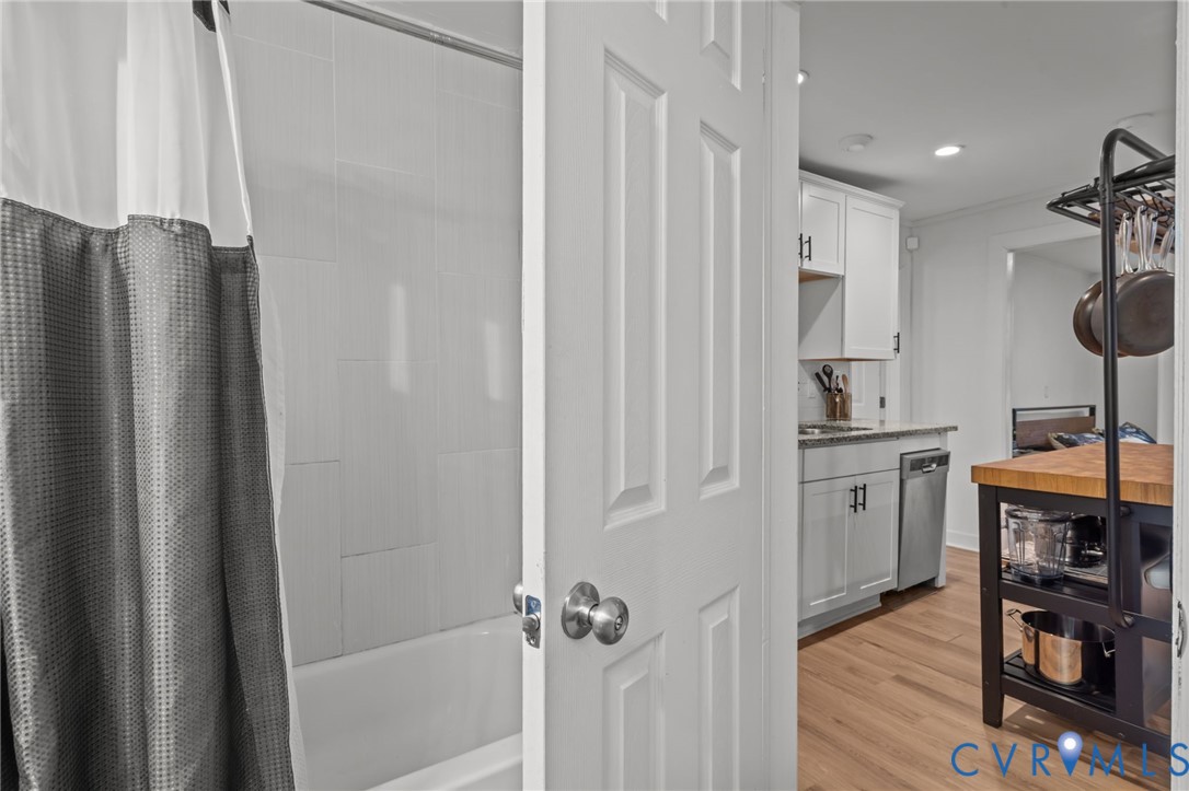 8874 Strath Road Henrico, VA 23231 - Photo 16 of 40 a kitchen with stainless steel appliances granite countertop a refrigerator and a stove top oven