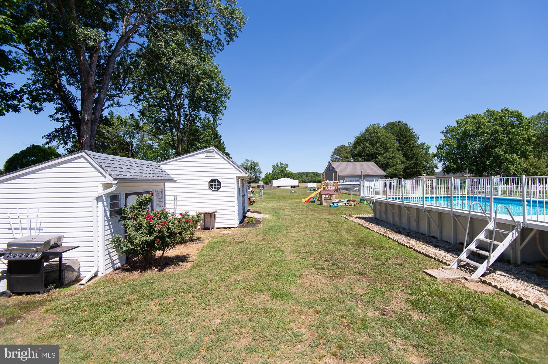 12 North Maple Avenue Ridgely, MD 21660 - Photo 17 of 30 a view of a backyard with sitting area