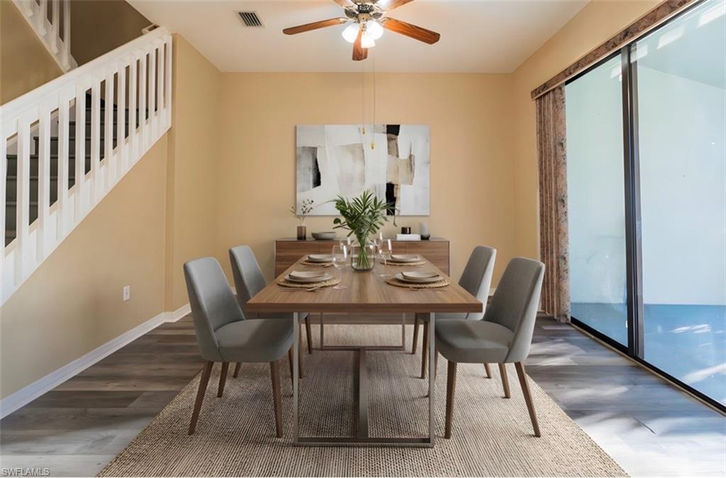 14751 Pinnacle Place, Unit 343 Naples, FL 34119 - Photo 18 of 24 Dining room featuring dark wood-style floors and ceiling fan