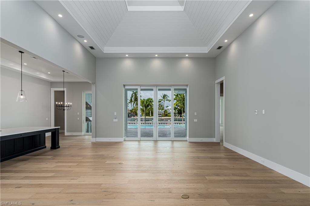 1810 Kingfish Road Naples, FL 34102 - Photo 6 of 10 Photo of 2100 Snook Dr, 1810 Kingfish Rd Family room design will be comparable