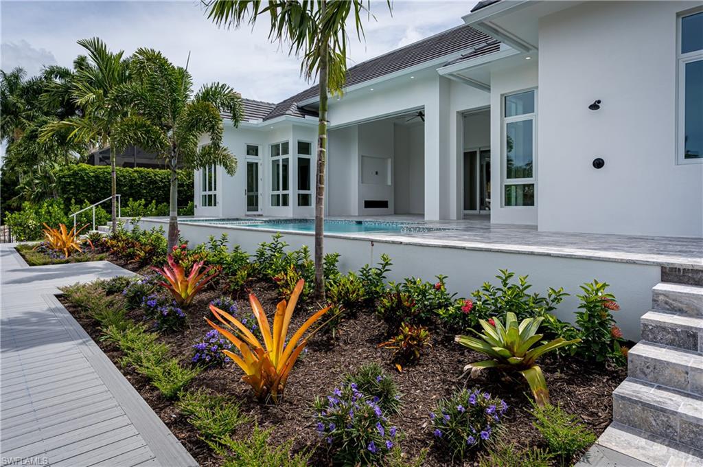 1810 Kingfish Road Naples, FL 34102 - Photo 10 of 10 Photo of 2100 Snook Dr Outdoor area and landscape 1810 Kingfish Rd landscape will be comparable