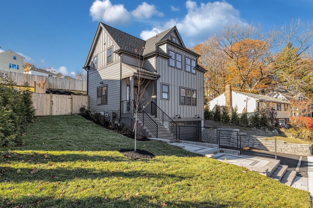 415 Poplar Street Boston, MA 02131 - Photo 1 of 31 a view of a house with swimming pool