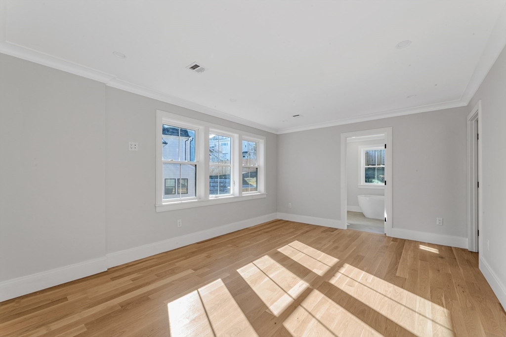 415 Poplar Street Boston, MA 02131 - Photo 15 of 31 a view of a room with a window
