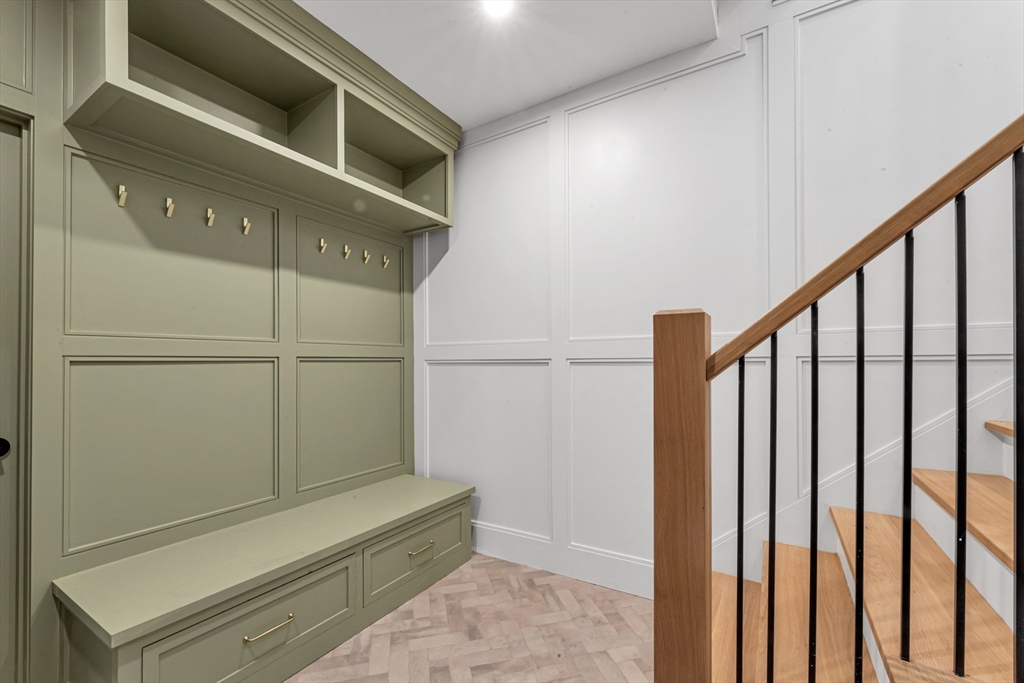 415 Poplar Street Boston, MA 02131 - Photo 26 of 31 a view of staircase with white walls