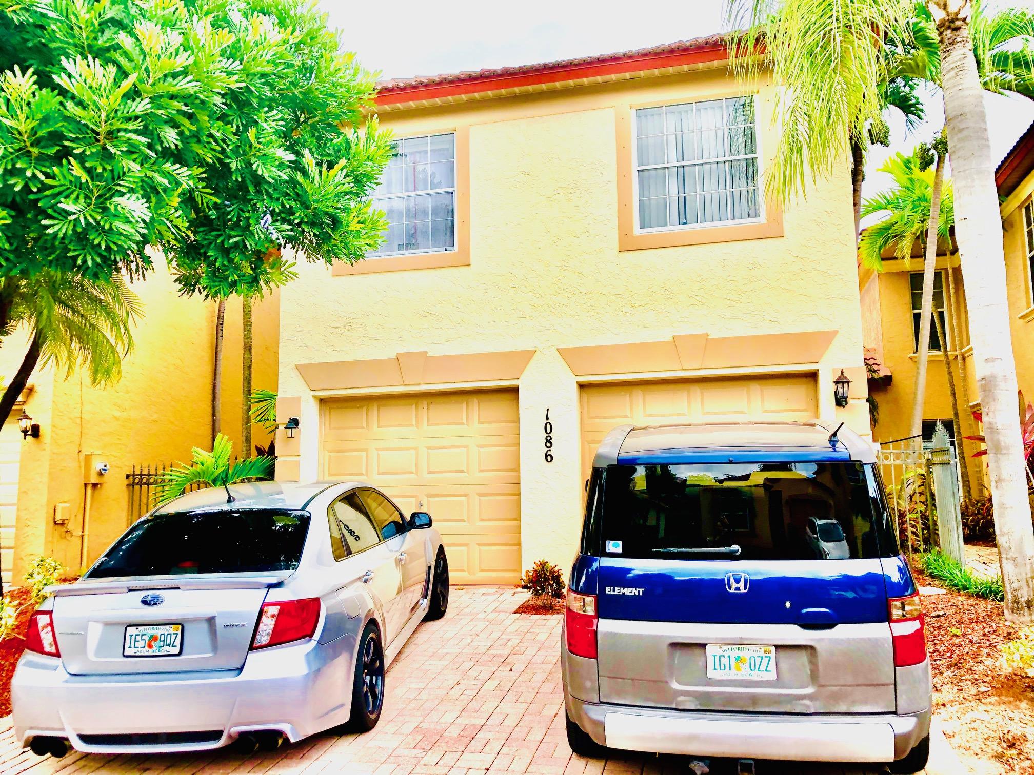 1086 Via Jardin Riviera Beach, FL 33418 - Photo 1 of 15 front