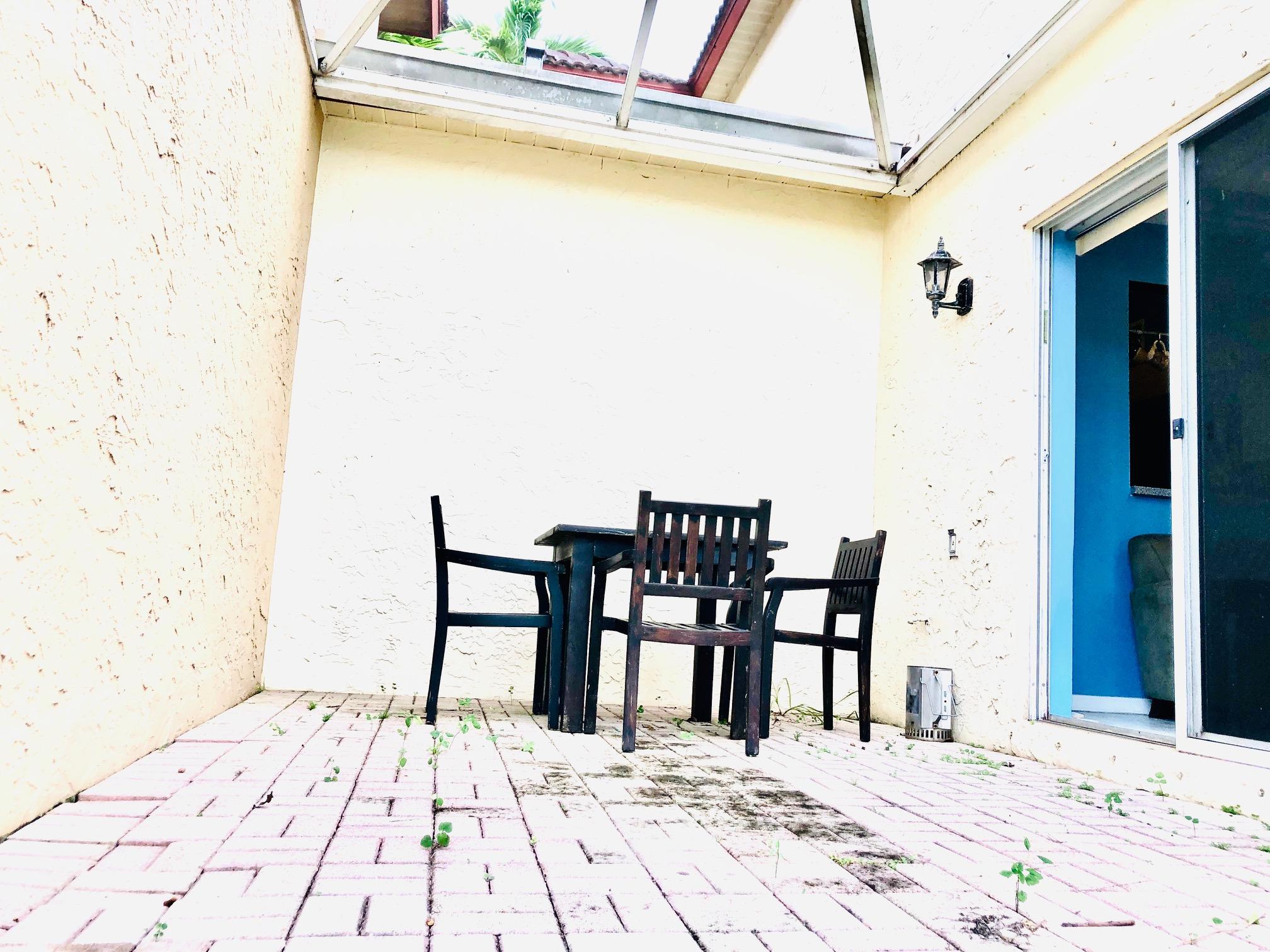 1086 Via Jardin Riviera Beach, FL 33418 - Photo 12 of 15 back patio